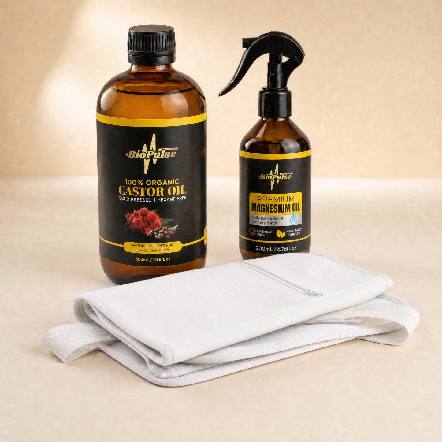 BioPulse 500mL organic castor oil bottle, 200mL Premium Magnesium Oil spray and a folded white wrap