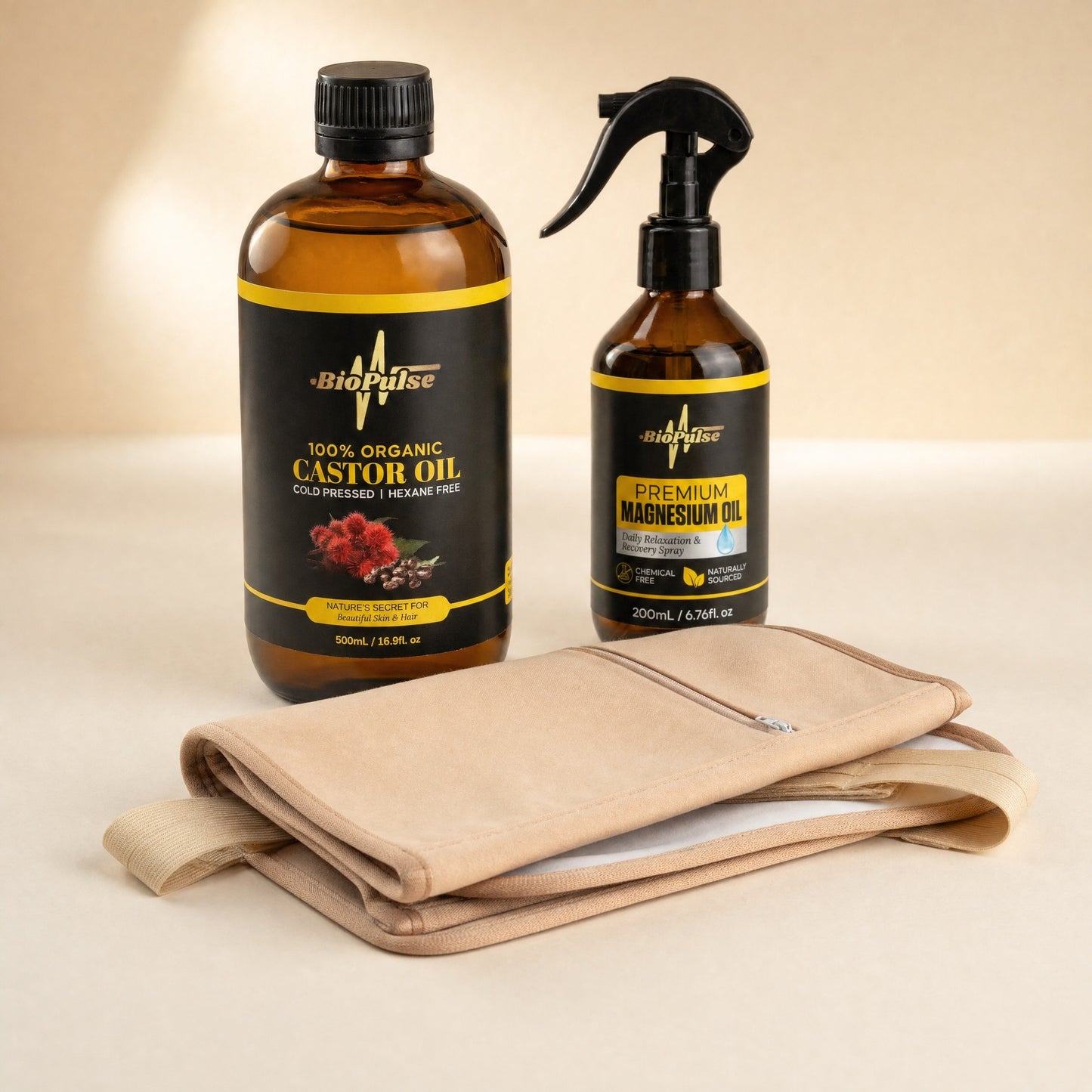 BioPulse 500mL organic castor oil bottle, 200mL Premium Magnesium Oil spray and a folded beige wrap