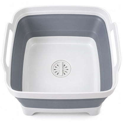 View inside the expanded FreshDip Fold basin showing the central drain plug and carry handles.