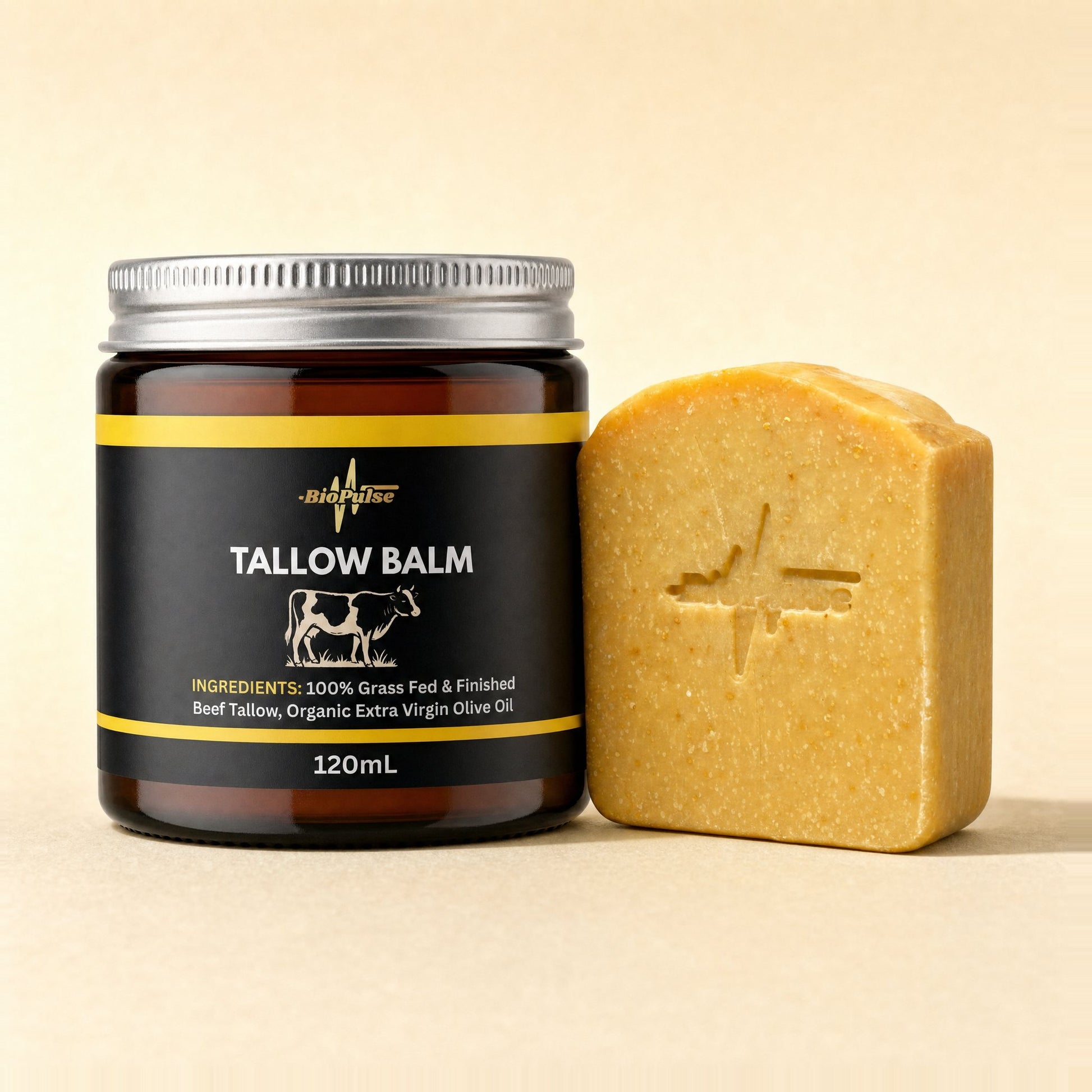 BioPulse Tallow Balm in a 120mL amber glass jar beside a golden orange tallow soap bar